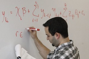 Miami-Dade high school advanced calculus teacher Orlando Sarduy writes out the formula that will grade and help determine the pay of Florida teachers.