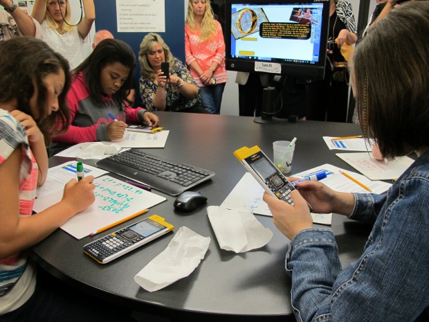 Sarasota County middle school students work on math problems in a "classroom of tomorrow."