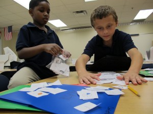 Second graders at Christel House Academy, a charter school in Indianapolis, play fraction games.