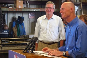 Former Florida Gov. Jeb Bush and Gov. Rick Scott at a campaign stop in Homestead.