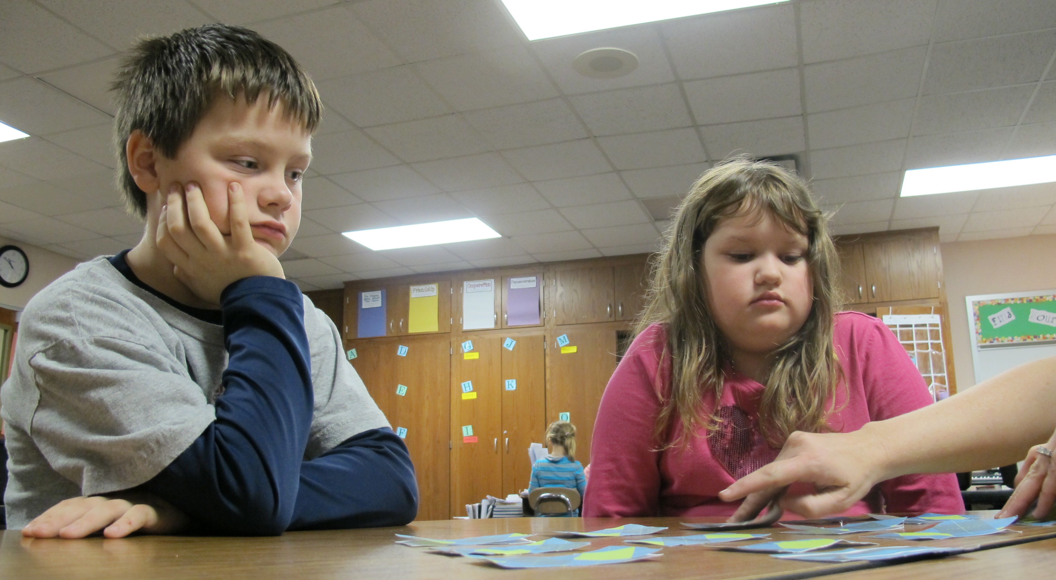 Two third grade students at Bloomington's Clear Creek Elementary play a