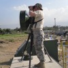 thirdherd First Lt. Jake Cadwell, with the 3rd Combat Communications Group, sets up a line-of-sight microwave transmitter.