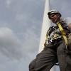 windjobs07 Canadian Valley Technical Center wind energy student Jessie Bean stands near of a 13-story wind turbine in El Reno.