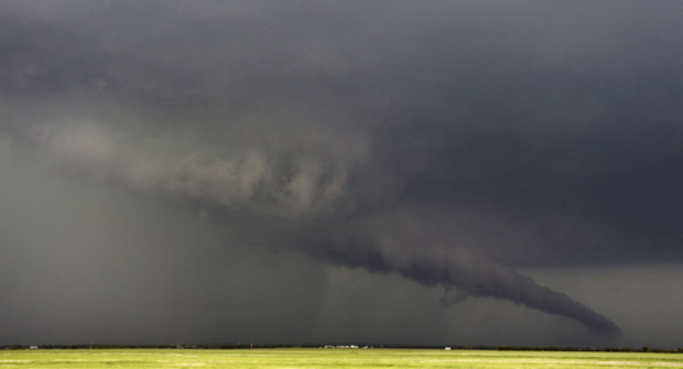 A massive storm front in May 2013 spawned a swarm of tornadoes, including this one near the Kansas/Oklahoma border.