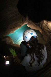 East Central University Undergraduate Lindsey Thompson navigates an underground passage for a look at the Arbuckle-Simpson Aquifer.