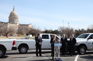 Gov. Mary Fallin at a March 2013 press conference in the parking lot of the capitol, which marked the delivery of CNG-powered Dodge Ram pickups for the state's fleet.