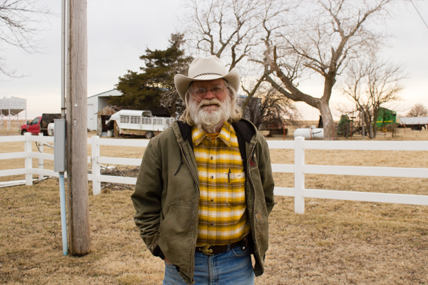 Joe Bush, owner of a ranch near Shidler, Okla., has signed agreements to lease land for two wind farms. Bush worries a 2014 bill that would impose a moratorium on some wind-energy projects would prevent the wind farms from being built.