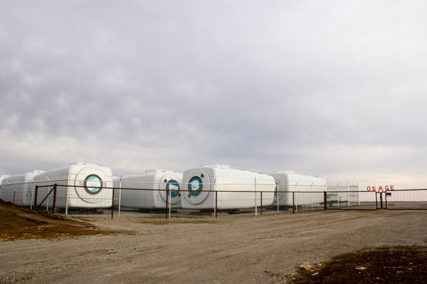 Turbine nacelles for an wind farm project are collecting at a staging area in Osage County.