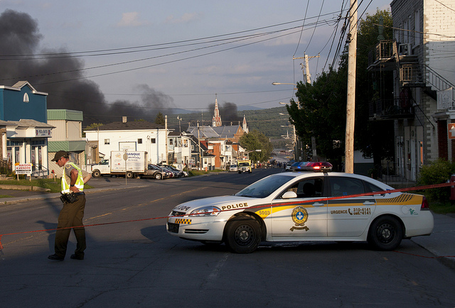 Smoke lingers a day after the Bakken crude oil train derailment in Lac-Mégantic, Quebec, which killed 47 people.