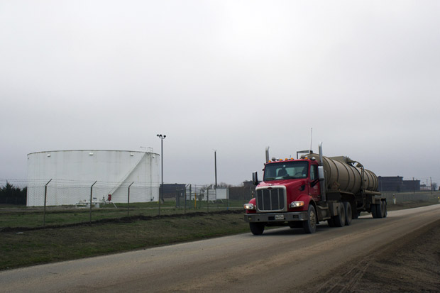 A tanker truck pulling into a terminal at the oil hub in Cushing, Okla.