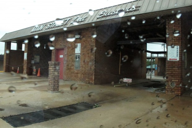 A closed car wash in Duncan, Okla. Under stage 5 water restrictions, commercial car washes had to cut their hours of operation. 