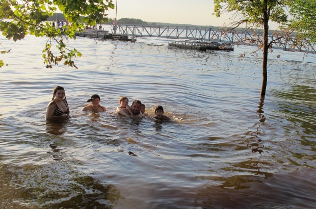 Justin Stratford and several of his nieces and nephews play in Lake Thunderbird on a road trip from Arizona.