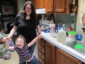 A jug of brown water sits on Kim McEvoy's counter. McEvoy says she needs to move to a town that provides treated water.