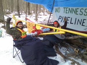 Alex Lotorto and Allison Petryk chain themselves to an access gate in the Delaware State Forest to protest construction of the Tennessee Gas pipeline in February, 2013. 