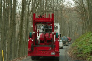 A drilling convoy heads through the Loyalsock State Forest.