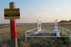 A natural gas pipeline runs across the prairie near Sidney, Montana.