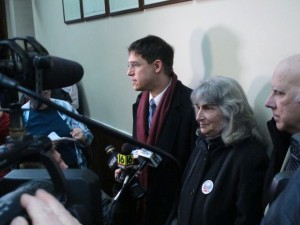 Scroggins and her attorneys talk to reporters outside a court hearing in March 2014.