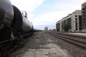 An oil train moves through the University Village neighborhood of Chicago. The trains pass through Chicago on their way to East Coast refineries.