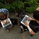 journalists on laptops