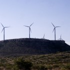 Wind turbines provide a sustainable source of energy in that they don't emit carbon dioxide or require water. Photo by KUT News