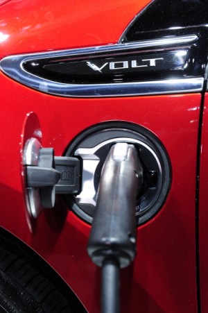 The Chevrolet Volt charges at the Consumer Electronics Show in 2011