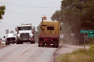 Truck traffic on FM 81 in the Eagle Ford Shale formation area. 