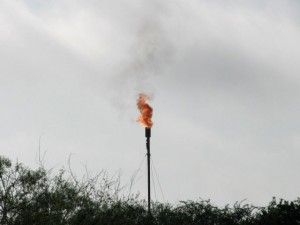 Flaring gas at well site in DeWitt County
