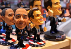 Dolls depicting US President Barack Obama and republican presidential candidate Mitt Romney are seen on a display with other electoral collective items at a gift shop at the Baltimore/Washington International Thurgood Marshall Airport in Baltimore, Maryland, on October 14, 2012.