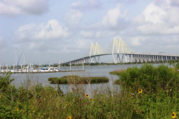 The "Centennial Gate" would be built parallel to the Fred Hartman Bridge that crosses the Houston Ship Channel