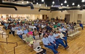 Attendees filled the Alexander Convention Center on Tuesday evening for a Texas Department of Transportation hearing in Cotulla, TX on their controversial plan to convert some paved roads to gravel to save money on maintenance.