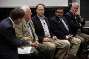 Mose Buchele (far left) moderates panel featuring (left to right) George Bristol, Carter Smith, Port Isabel Mayor Joe Vega, and state Rep. Lyle Larson 