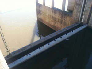 One floodgate is completely broken and has been blocked with a "stop log."
