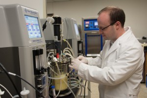 Hal Alper mixes ingredients for biofuel at UT Austin.