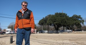 Michael Fossum of the Austin Heritage Tree Foundation stands in front of the heritage Live Oak known as the "Taco Bell Tree." Fossum and his group fought to save the tree from being cut down for a traffic project. Now it's going to be moved across the street. 