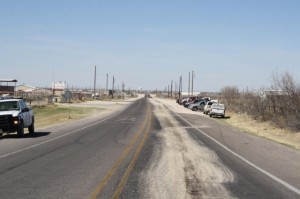 Sand applied to a long trail of oil drilling waste illegally dumped in Ector Co. 