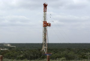 A rig contracted by Apache Corp drills a horizontal well in a search for oil and natural gas in the Wolfcamp shale located in the Permian Basin in West Texas. 