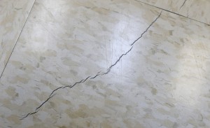 Cracks have developed in the floor and wall of the municipal courtroom in Reno, Texas, as seen Feb. 21, 2014, and some people believe it is related to the rash of earthquakes in the area.