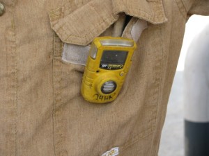Oil field workers wear these safety alert devices that detect hydrogen sulfide gas