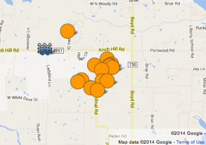 A map of earthquakes in Reno (orange dots) near the XTO disposal well (blue horizontal waves). 