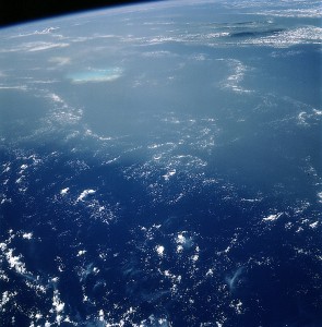 This image, taken by astronauts in the International Space Station from 160 above Earth, shows a Saharan dust cloud (in the frame's top half) floating across the Caribbean. The camera is pointed southwest and the land in the upper right is Haiti. 