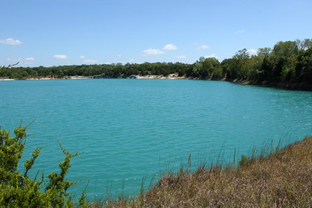 After this quarry near a U.S. Silica sand mining operation was mined out, clear blue aquifer water filled it in.