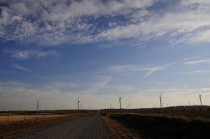 Wind turbines line the horizon near Kingfisher, Okla.