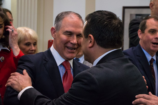 Attorney General Scott Pruitt shakes hands at the Oklahoma capitol in February 2017.