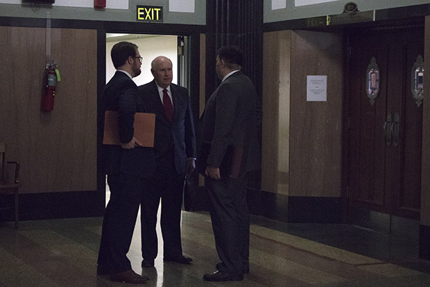 Center for Media and Democracy attorney Robert Nelon, center,  outside a courtroom in Oklahoma City.