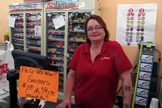 Geary, Oklahoma, Family Dollar manager Jacquie Hogue running the register in her store.