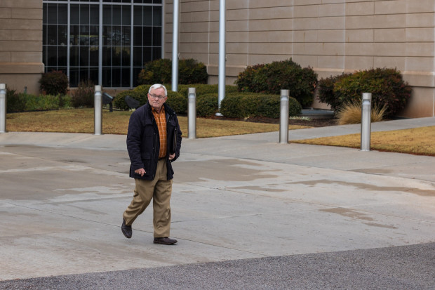 Mickey Thompson, founder and director of Restore Oklahoma Now, leaves the attorney general's office after filing paperwork for State Question 795.