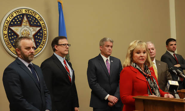 Gov. Mary Fallin, district attorneys and legislators announced an agreement on criminal justice legislation at a March 5 press conference.