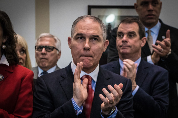 Former Oklahoma Attorney General Scott and current U.S. EPA Administrator Scott Pruitt joins in an applause at the Oklahoma Capitol in 2017.