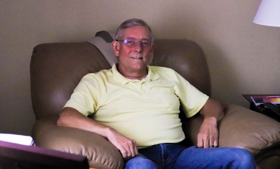 David Rowden sits in an armchair in his Chandler, OK home.