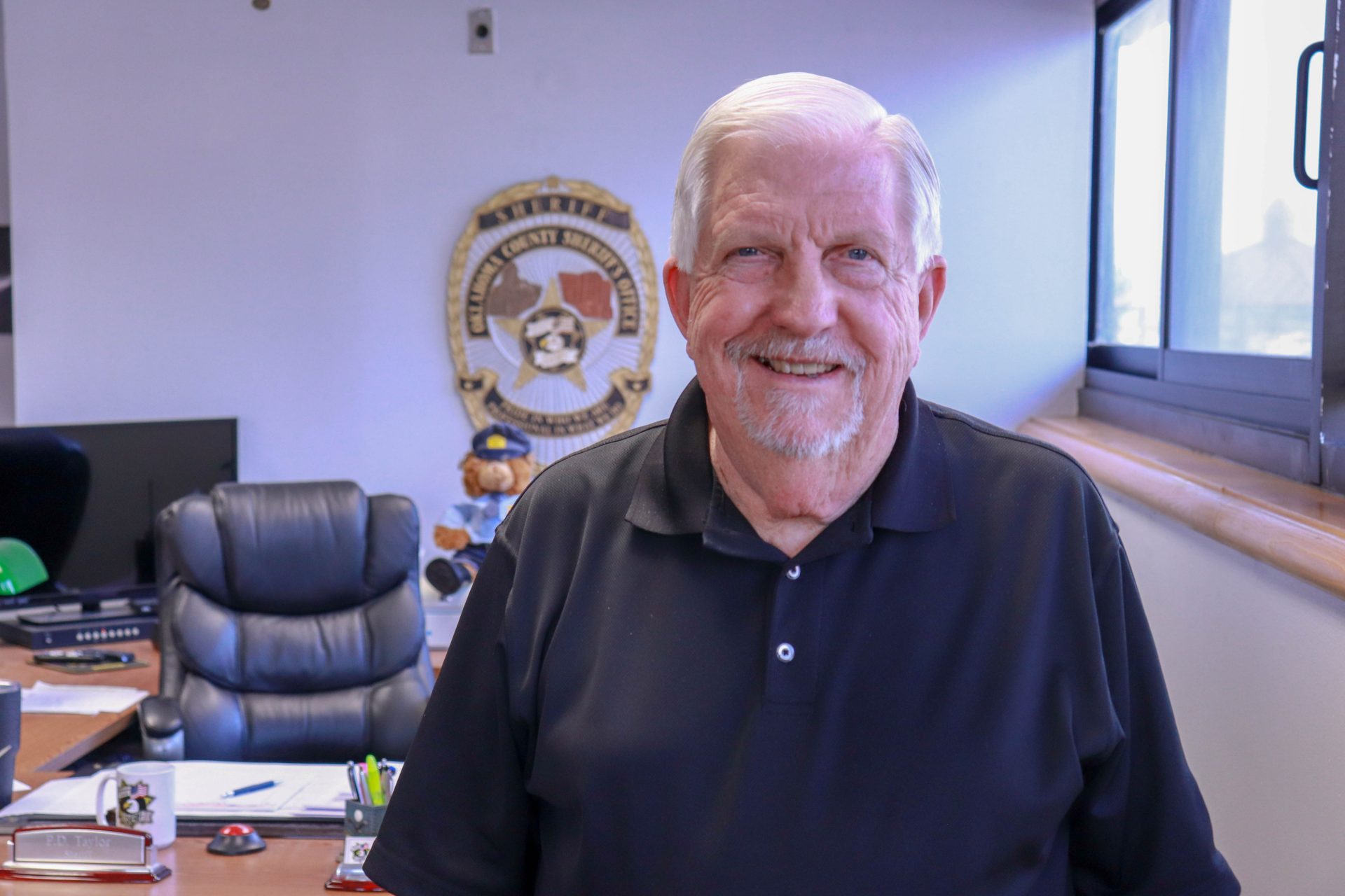 Sheriff P.D. Taylor stands in his office inside the Oklahoma County Sheriff's Office.